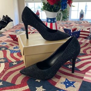 Worn once Michael Kors Glitter Chain Mesh Claire pump, size 8.